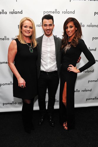 Kevin and Danielle Jonas stopped to pose with designer Pamella Rowland before her Monday show.
Kevin and Danielle Jonas stopped to pose with designer Pamella Rowland before her Monday show.