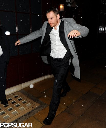 Michael Fassbender put on his coat while leaving a BAFTA Awards afterparty.
Michael Fassbender put on his coat while leaving a BAFTA Awards afterparty.