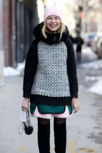 Natalie Joos bundled up with pretty pink accents and patterned knits.
Natalie Joos bundled up with pretty pink accents and patterned knits.