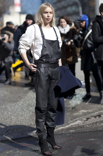 We've been waiting to see these leather overalls in action; this show-goer gave hers a minimalist finish with a sweatshirt and sheer black booties.
We've been waiting to see these leather overalls in action; this show-goer gave hers a minimalist finish with a sweatshirt and sheer black booties.
