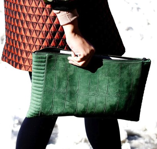 We love the slick nature of this forest green suede clutch.
We love the slick nature of this forest green suede clutch.