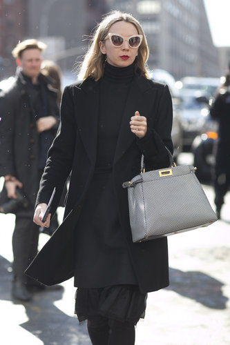 Quirky shades livened up these all-black layers.
Quirky shades livened up these all-black layers.