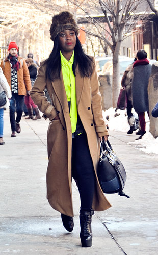 Note how just a pop of neon perked up a classic camel coat. Now test-drive the look on your own.
Note how just a pop of neon perked up a classic camel coat. Now test-drive the look on your own.