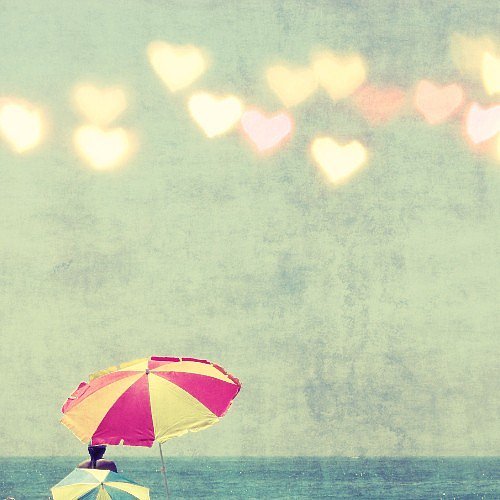 Heart-shaped bokeh details give this beach umbrella fine art photo ($30) a love-inspired twist.
Heart-shaped bokeh details give this beach umbrella fine art photo ($30) a love-inspired twist.