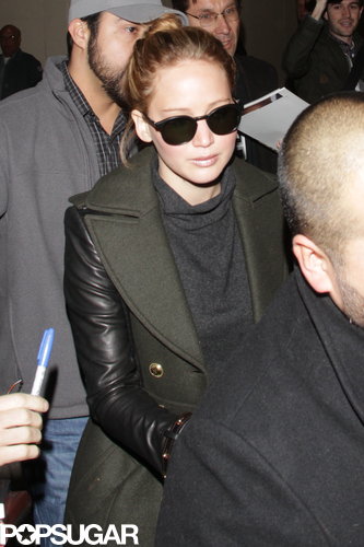 Jennifer Lawrence Gets the Giggles While Flying Home With Her Teddy Jennifer Lawrence Gets the Giggles While Flying Home With Her Teddy