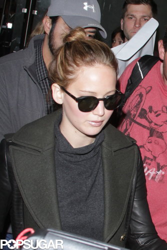 Jennifer Lawrence Gets the Giggles While Flying Home With Her Teddy Jennifer Lawrence Gets the Giggles While Flying Home With Her Teddy