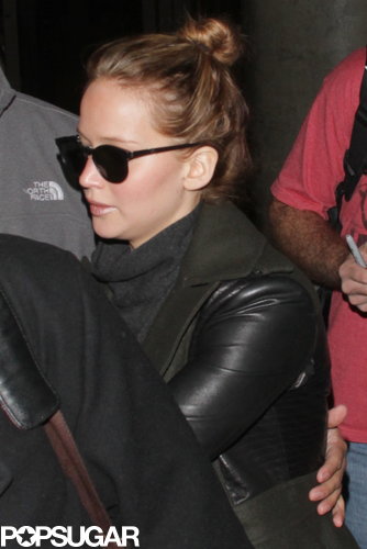 Jennifer Lawrence Gets the Giggles While Flying Home With Her Teddy Jennifer Lawrence Gets the Giggles While Flying Home With Her Teddy