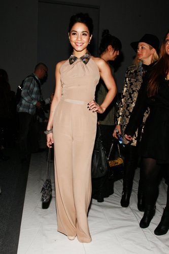 Vanessa Hudgens looked playful in an embellished-collar Jenny Packham jumpsuit and Jerome C. Rousseau platform sandals at Packham's show.
Vanessa Hudgens looked playful in an embellished-collar Jenny Packham jumpsuit and Jerome C. Rousseau platform sandals at Packham's show.