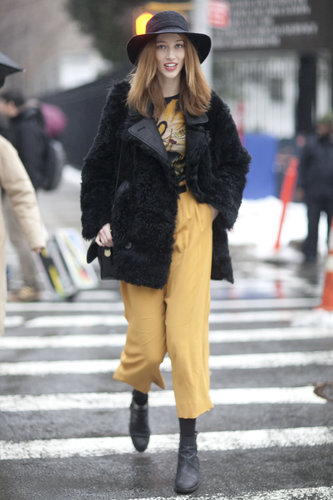 '70s-inspired hues and hat juxtaposed against a furry moto-style jacket.
'70s-inspired hues and hat juxtaposed against a furry moto-style jacket.