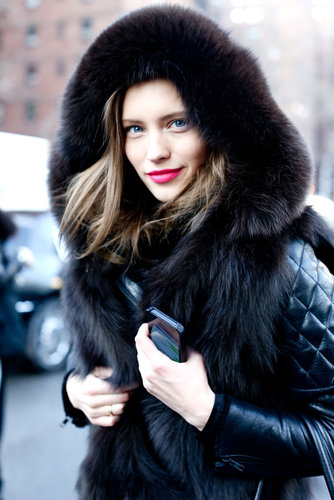 Tucked away inside her Winter-appropriate fur-lined jacket, this woman gave us just a hint of Spring across her lips.
Tucked away inside her Winter-appropriate fur-lined jacket, this woman gave us just a hint of Spring across her lips.