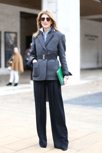 A menswear-style mix with easy trousers and a pop of color caught our attention outside the tents.
A menswear-style mix with easy trousers and a pop of color caught our attention outside the tents.