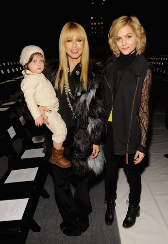 Rachel Zoe and Leigh Lezark donned two different, but equally stunning coats, at Rachel's Fall 2013 show. Although Rachel definitely has the cutest accessory, baby Skyler.
Rachel Zoe and Leigh Lezark donned two different, but equally stunning coats, at Rachel's Fall 2013 show. Although Rachel definitely has the cutest accessory, baby Skyler.