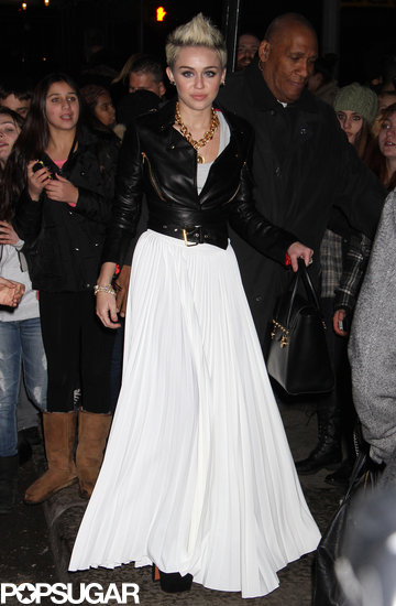 Miley Cyrus wore a white maxi skirt to her Cosmopolitan cover party in NYC.
Miley Cyrus wore a white maxi skirt to her Cosmopolitan cover party in NYC.