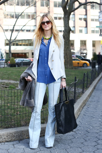 This showgoer steered her flares from the more predictable '70s route with a bright white jacket and fresh button-down.
This showgoer steered her flares from the more predictable '70s route with a bright white jacket and fresh button-down.