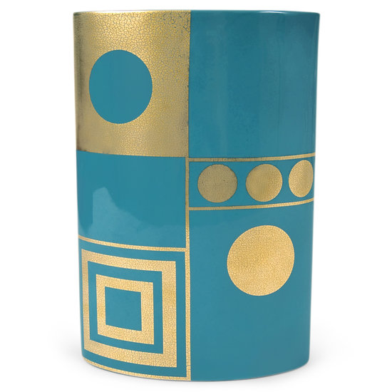 Snag a similar look with a teal-and-gold vase ($125) that also mixes color and pattern.
Snag a similar look with a teal-and-gold vase ($125) that also mixes color and pattern.