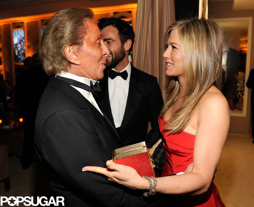 Jennifer Aniston shared a moment with Valentino Garavani at the Vanity Fair Oscar party after Sunday night's award show.
Jennifer Aniston shared a moment with Valentino Garavani at the Vanity Fair Oscar party after Sunday night's award show.