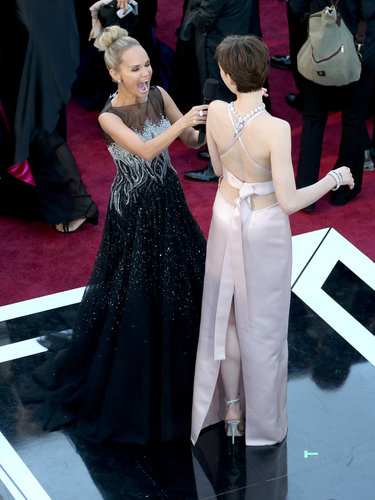 Anne Hathaway cracked Kristin Chenoweth up on the carpet.
Anne Hathaway cracked Kristin Chenoweth up on the carpet.