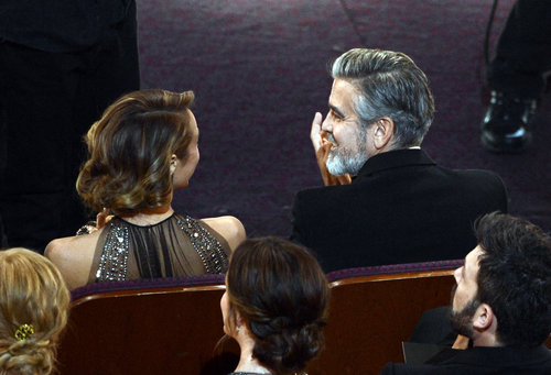 George Clooney and Stacy Keibler had a sweet moment in the audience at the Oscars.
George Clooney and Stacy Keibler had a sweet moment in the audience at the Oscars.