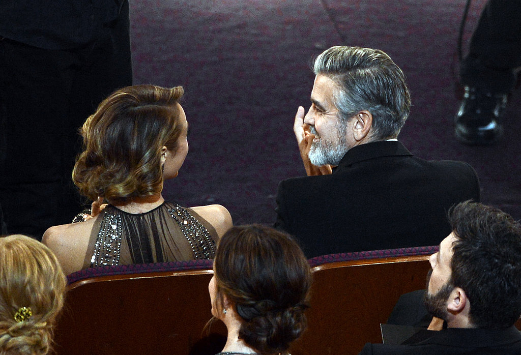 George Clooney and Stacy Keibler had a sweet moment in the audience at the Oscars.
George Clooney and Stacy Keibler had a sweet moment in the audience at the Oscars.