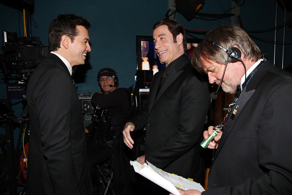 Seth MacFarlane and John Travolta backstage at the 2013 Oscars.
Seth MacFarlane and John Travolta backstage at the 2013 Oscars.