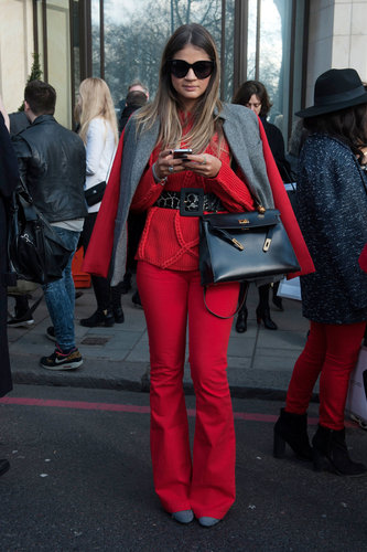 Red on red emboldened this showgoer's separates.
Red on red emboldened this showgoer's separates.