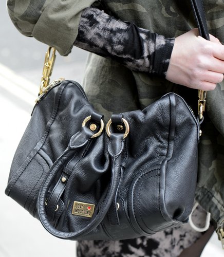 A Moschino satchel was the perfect accompaniment to printed jeans and a camouflage jacket.
A Moschino satchel was the perfect accompaniment to printed jeans and a camouflage jacket.