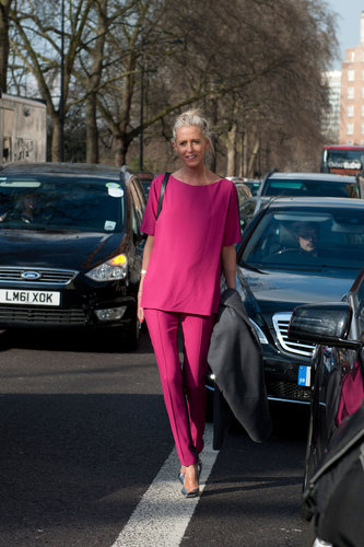 This showgoer quite literally stopped traffic in her monochrome fuchsia ensemble.
This showgoer quite literally stopped traffic in her monochrome fuchsia ensemble.