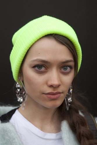 A casual neon green beanie and stunning earrings gave this off-duty look instant interest.
A casual neon green beanie and stunning earrings gave this off-duty look instant interest.