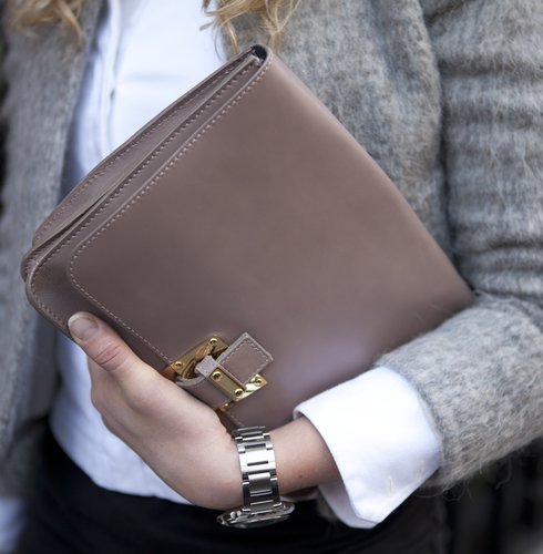 A taupe clutch lent a ladylike touch to Winter neutrals.
A taupe clutch lent a ladylike touch to Winter neutrals.