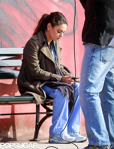 Mila Kunis checked her phone while filming in LA on Wednesday.
Mila Kunis checked her phone while filming in LA on Wednesday.