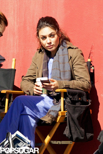 Mila Kunis took a break between takes on set Wednesday afternoon.
Mila Kunis took a break between takes on set Wednesday afternoon.