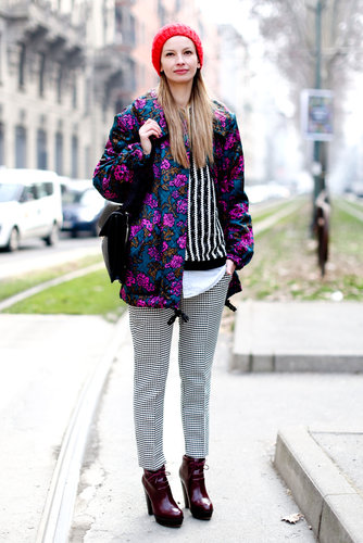 Florals, stripes, checks, and splashes of bright color all came together in easy proportions on this attendee's punk-meets-prep ensemble.
Florals, stripes, checks, and splashes of bright color all came together in easy proportions on this attendee's punk-meets-prep ensemble.