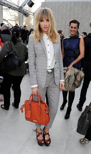 Suki Waterhouse at the Burberry Fall 2013 show in London.
Suki Waterhouse at the Burberry Fall 2013 show in London.