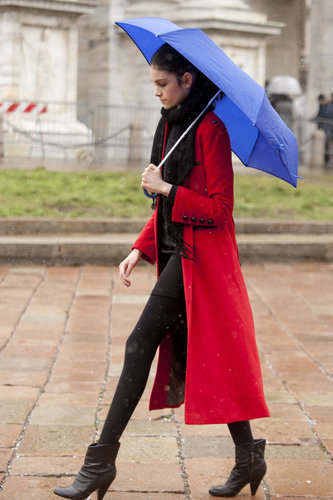 A bright cobalt umbrella happened to be the perfect accompaniment to this showgoer's brilliant red coat.
A bright cobalt umbrella happened to be the perfect accompaniment to this showgoer's brilliant red coat.