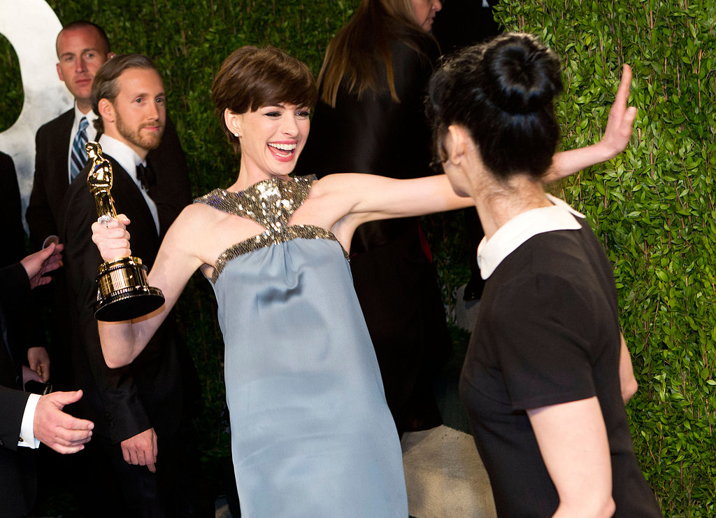 Anne Hathaway greeted Sarah Silverman on the red carpet.
Anne Hathaway greeted Sarah Silverman on the red carpet.