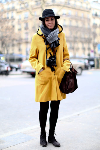 Street-chic perfection in a bold yellow coat — a camera was the ideal Fashion Week accessory.
Street-chic perfection in a bold yellow coat — a camera was the ideal Fashion Week accessory.