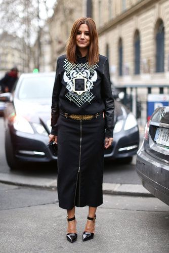Christine Centenera worked her signature edgy brand of chic in a zippered pencil skirt and printed sweatshirt.
Christine Centenera worked her signature edgy brand of chic in a zippered pencil skirt and printed sweatshirt.