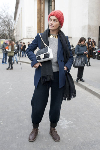 This ensemble has all the makings of tomboy cool with a perfect dose of the trends via a metallic collar necklace and black and white Chanel.
This ensemble has all the makings of tomboy cool with a perfect dose of the trends via a metallic collar necklace and black and white Chanel.
