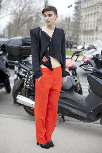 An angular jacket and bared midriff gave boyish trousers a high-fashion update.
An angular jacket and bared midriff gave boyish trousers a high-fashion update.