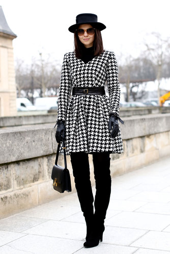 A houndstooth-print white and black coat gave over-the-knee boots more polish.
A houndstooth-print white and black coat gave over-the-knee boots more polish.