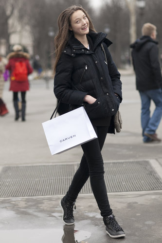 This showgoer threw out the sporty vibe in a puffer jacket and high-tops.
This showgoer threw out the sporty vibe in a puffer jacket and high-tops.