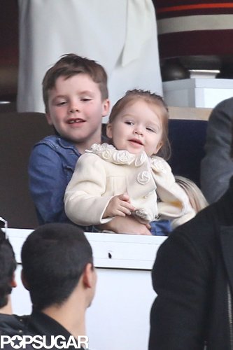 Cruz Beckham held little sister, Harper, while watching dad David Beckham play with Paris Saint-Germain in March.
Cruz Beckham held little sister, Harper, while watching dad David Beckham play with Paris Saint-Germain in March.