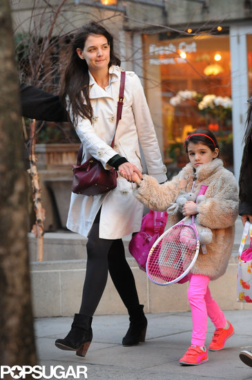 Suri Picks Up a Pink Racket For Tennis With Katie Holmes Suri Picks Up a Pink Racket For Tennis With Katie Holmes