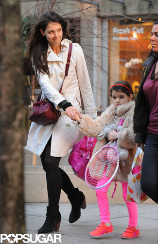 Suri Picks Up a Pink Racket For Tennis With Katie Holmes Suri Picks Up a Pink Racket For Tennis With Katie Holmes