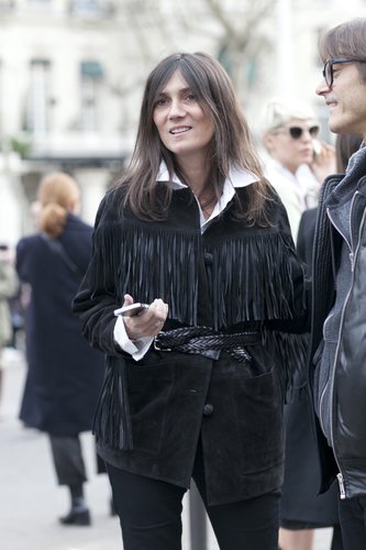 Emmanuelle Alt dressed up a white button-down with a fringed jacket.
Emmanuelle Alt dressed up a white button-down with a fringed jacket.