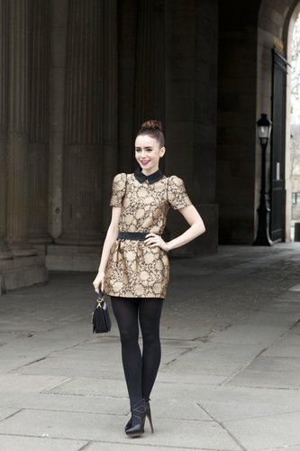 Lily Collins was perfectly ladylike in a gold-hued mini.
Lily Collins was perfectly ladylike in a gold-hued mini.