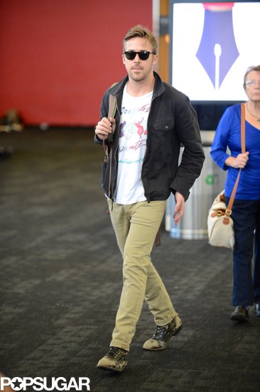 Ryan Gosling prepared to depart from LAX with Eva Mendes.
Ryan Gosling prepared to depart from LAX with Eva Mendes.
