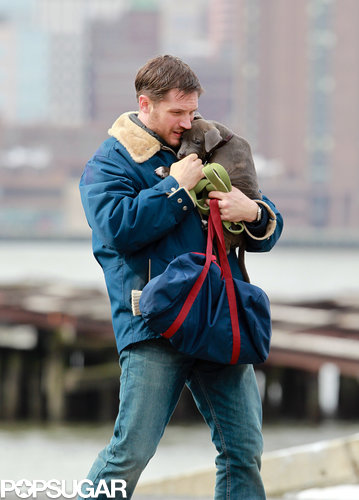 Tom Hardy Cuddles Up to a Canine Costar on Set Tom Hardy Cuddles Up to a Canine Costar on Set