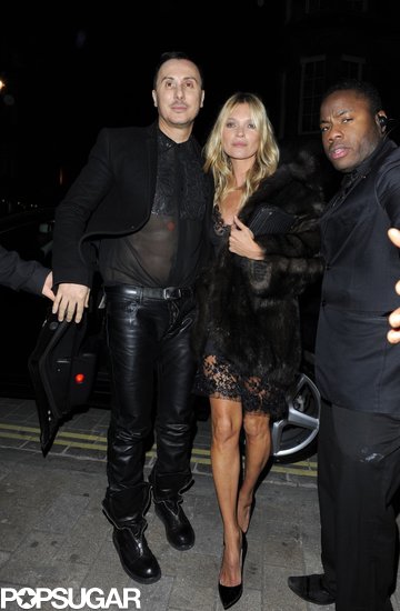 Kate Moss arrived at the launch of hair care brand Kérastase's new Couture Styling Line with friend and stylist Luigi Murenu in London on Monday. Kate Moss arrived at the launch of hair care brand Kérastase's new Couture Styling Line with friend and stylist Luigi Murenu in London on Monday.