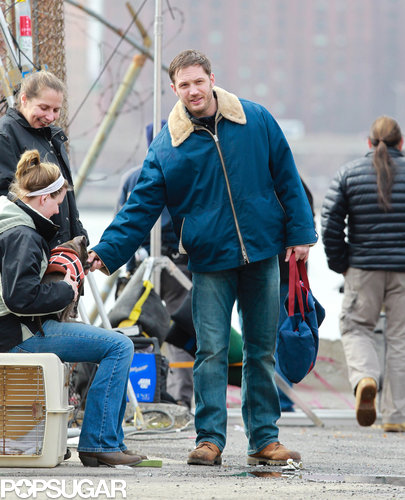 Tom Hardy Cuddles Up to a Canine Costar on Set Tom Hardy Cuddles Up to a Canine Costar on Set